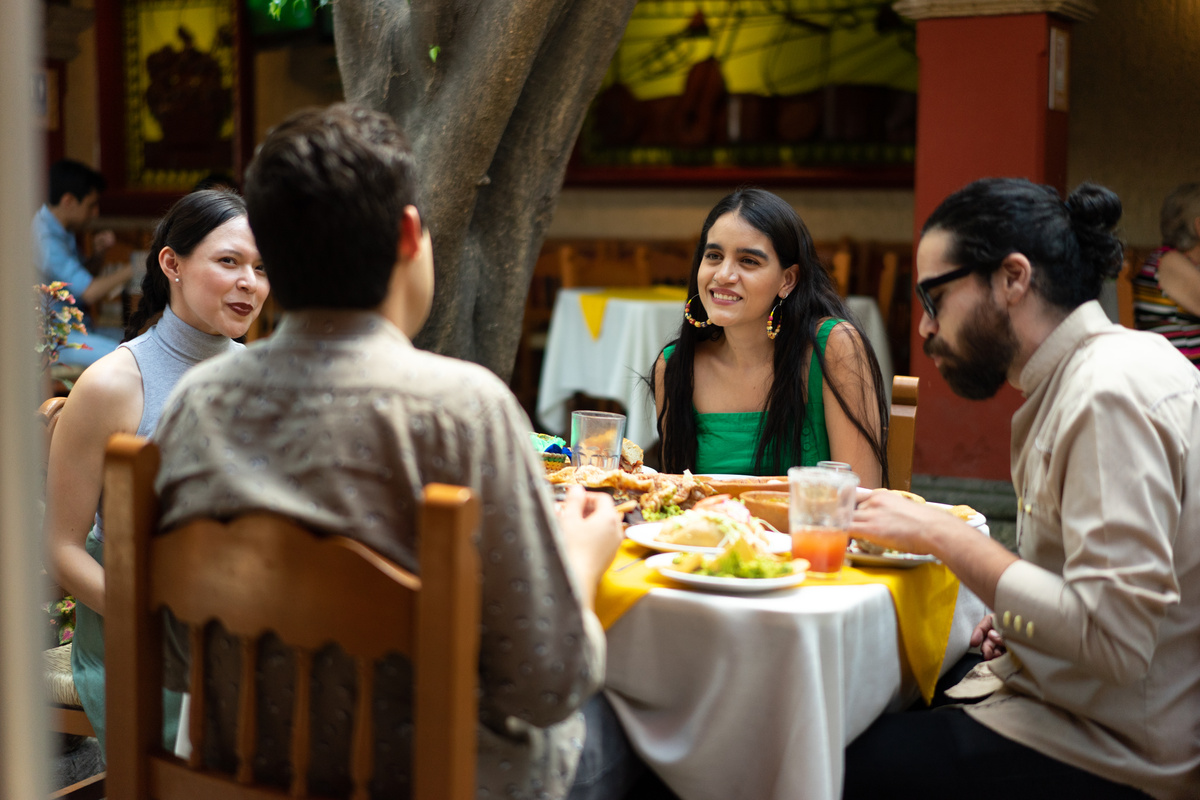 Group of Friends Eating at Mexican Restaurant